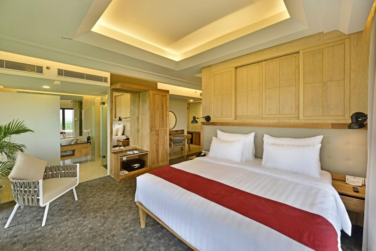 Famvida Hotel Lubuklinggau Habitación foto