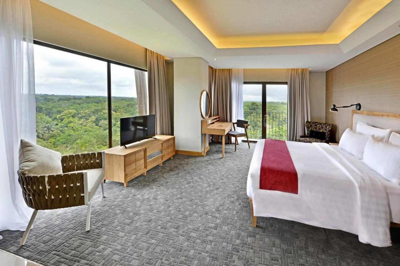 Famvida Hotel Lubuklinggau Habitación foto