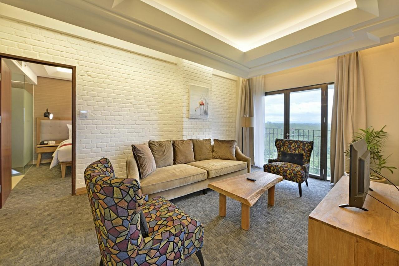 Famvida Hotel Lubuklinggau Habitación foto