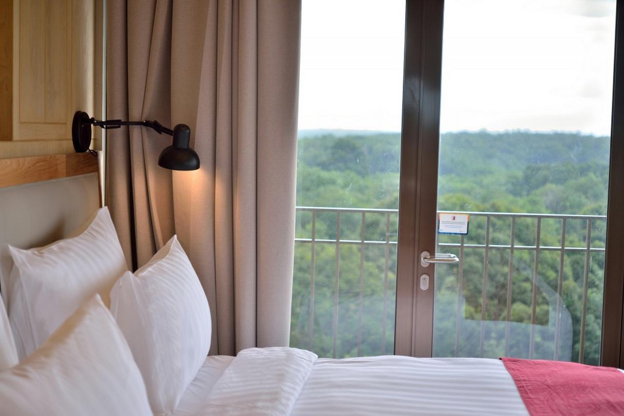 Famvida Hotel Lubuklinggau Habitación foto